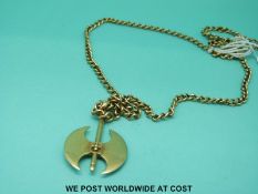 A 9ct gold chain (15.5g) with a yellow metal pendant in the form of an axe marked 585 (5.