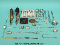 A quantity of hallmarked silver and white metal cutlery including Victorian figural handled knife,