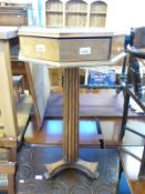 A parquetry pedestal table with drawer (H81xD51cm)