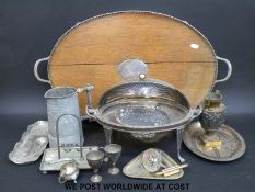 A large collection of silver plated items to include meat dome, serving dishes, candlesticks,