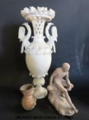 A large Victorian parian vase together with a terracotta statue of a youth sitting on a rock and an