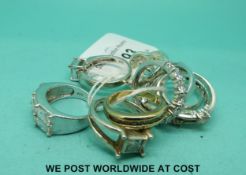 Ten silver rings set with cubic zirconia and paste