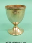 A hallmarked silver egg cup, Sheffield 1922,