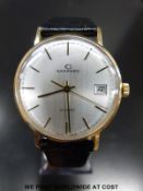 Garrard 9ct gold gentleman's wristwatch with two-tone hands and baton markers and date aperture on