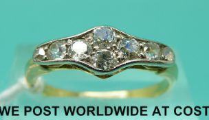 An 18ct gold ring set with eight old cut diamonds (size O)