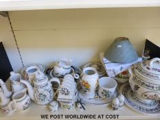 A large collection of Portmeirion Botanic Garden tableware including a large twin handled pedestal