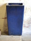 A blue square tapering plant pot (height 60cm)