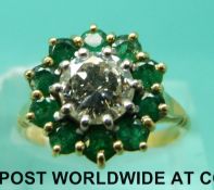 An 18ct gold ring set with a diamond of approximately 1.