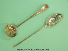 A Georgian bottom hallmarked silver mote spoon and a Georgian hallmarked silver sifter spoon weight