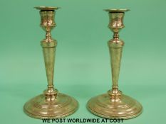 A pair of Edward VII hallmarked silver candlesticks, London 1902 maker William Hutton & Sons Ltd,