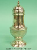 A Georgian hallmarked silver pepper, height 10.