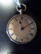 A ladies yellow metal keywind fob watch, the chased decorated case stamped 18L, no.