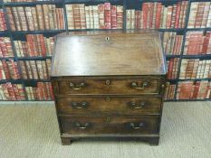 A Georgian mahogany bureau with fitted interior,