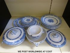 A collection of blue and white Nankin china by Booths to include dinner plates, tureens,