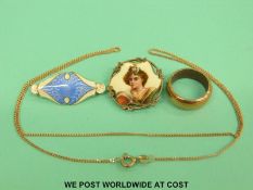 A hallmarked silver brooch set with guilloche enamel, an enamel brooch depicting a woman,