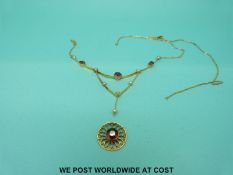 An Edwardian necklace set with seed pearls and amethysts marked 9ct gold
