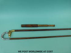 A two draw telescope and two walking sticks
