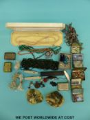 A collection of costume jewellery including a coral and malachite bead necklace, stanhope whistle,
