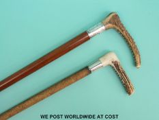 Two hallmarked silver mounted riding crops