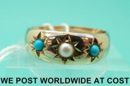 A late Victorian/early Edwardian ring set with a pearl and two turquoise in a star setting (size Q)