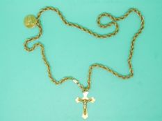A yellow metal rope twist necklace marked 14k with yellow metal crucifix and 18ct gold medallion