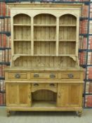 A 19th/20thC pine dresser with three drawers,
