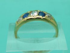 An 18ct gold Victorian sapphire and diamond ring (size O)