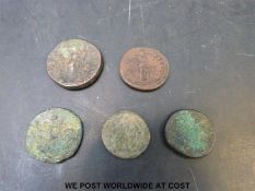 Five Roman bronze coins (largest 30mm) includes Nero and Hadrian