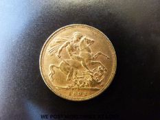 An 1892 gold full sovereign,
