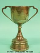 A hallmarked silver two handled trophy cup, Birmingham 1931, height 14.