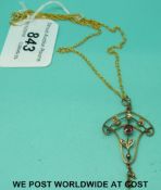 An Edwardian pendant set with amethysts and seed pearls on a 9ct gold chain