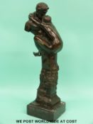 A bronze erotic statue of a satyr with lady entwined (height 50cm)