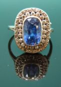 A Victorian white metal ring set with a cushion cut natural sapphire of approximately 4.