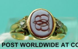 A Victorian yellow metal ring dated 1852,