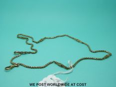 A yellow metal watch chain/ necklace made up of pierced links (11g)