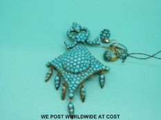 A 19thC pendant/ brooch set with turquoise to verso glass compartment with a pair of similar