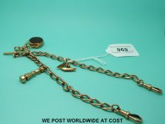 A 9ct rose gold double Albert with 9ct gold swivel fob and two 9ct gold charms (50.