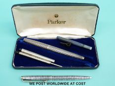 A cased Parker fountain pen marked sterling silver together with a matching similarly marked
