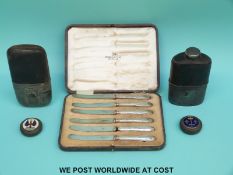 Two hip flasks with pull off cups,