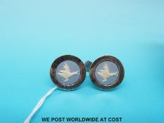 A pair of silver cufflinks by Stephen Webster for Wedgwood depicting geese 