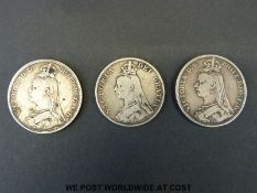 Two Victorian Jubilee crowns, 1887 and 1889, together with a Jubilee double florin,