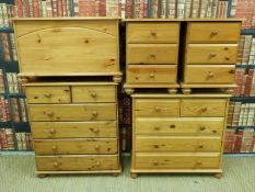 A suite of pine furniture including two chests of two over three and two over four drawers,