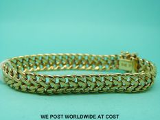 A 9ct gold bracelet with plaited design (11.