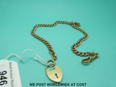 A 9ct gold watch chain and a 9ct gold padlock clasp (48g)