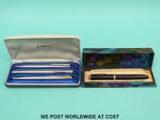 A cased set of three Parker pens,