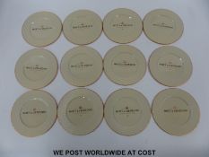 Twelve Moet & Chandon branded coasters in original box with original wrapping