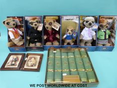 Seven Compare The Market meerkats together with a boxed set of Christmas crackers, ceramic jug,