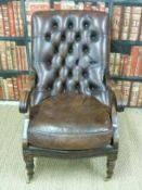 A leather Chesterfield armchair with mahogany frame,