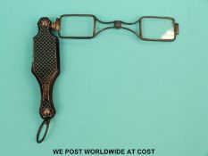 A set of gold inlaid picquet work tortoiseshell cased folding spectacles