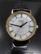 Rotary 9ct gold gentleman's wristwatch with date aperture and Roman numerals on white face,